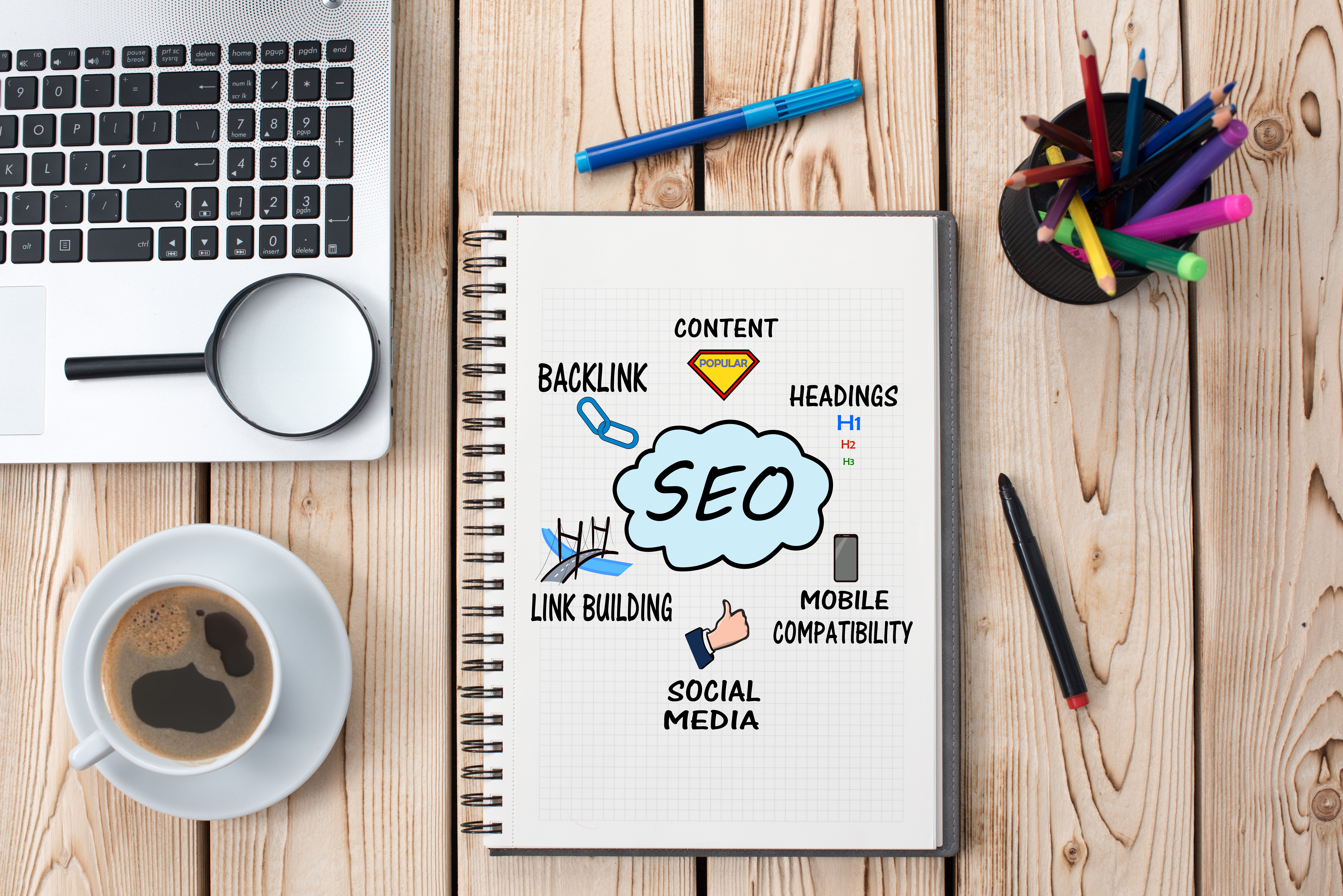 Search Engine optimization notebook on tabletop
